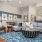 large, furnished clubhouse with kitchen and ample lighting