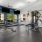wall of picture windows brighten spacious fitness center