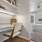 lighted study desk and built-in shelving above next to bedroom at retreat at chelsea park